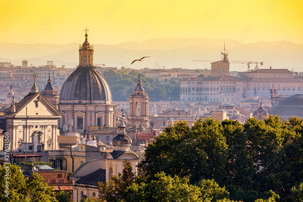 Cityscape view of historic center of Rome, Italy from the Gianicolo hill during summer sunny day sunset