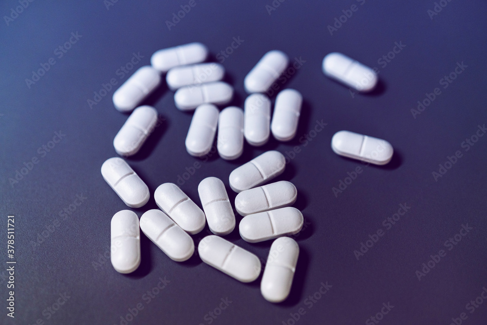 Prescription medication on purple background
Prescription medication on purple background