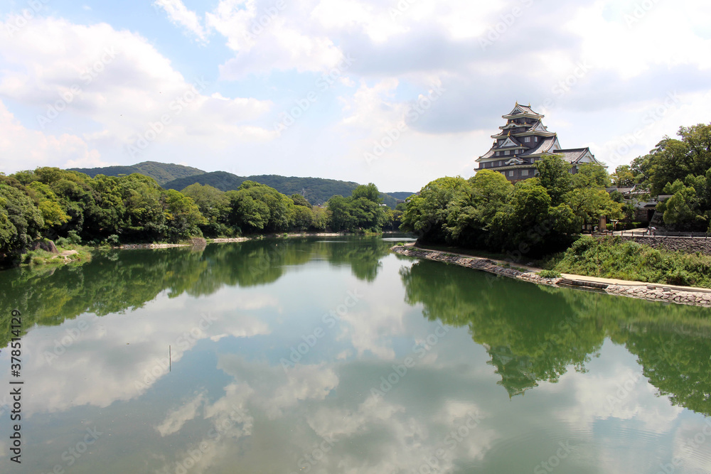 Lake reflection of Okayama-jo or Okayama Castle