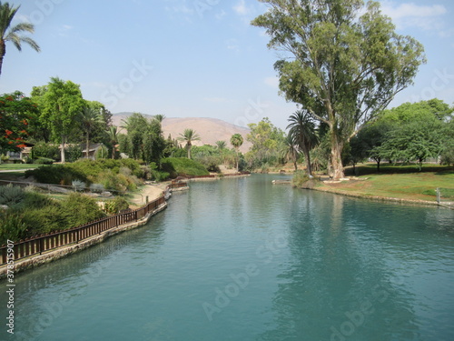 Gorgeous blue Tel Amar river in Nir David, Israel with Gilboa Mountains seen in the background