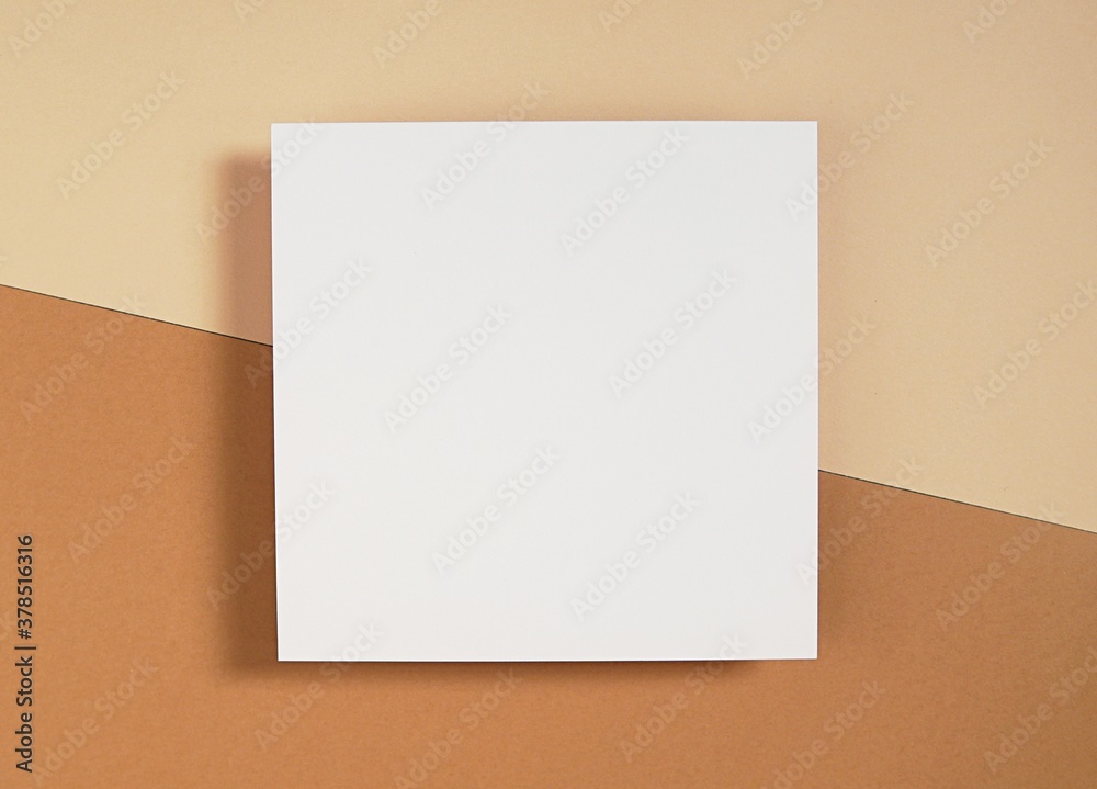 Square empty card mockup, for invitation, thank you card, greeting card design, blank paper on brown background with shadow, flatly, top view. Square empty card mockup, for invitation, thank you card, greeting card design, blank paper on brown background with shadow, flatly, top view.