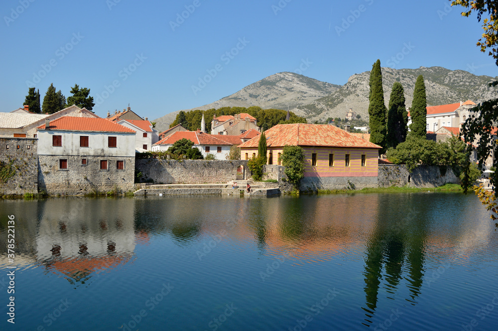 View of Old Town of Trebinje on the bank of Trebisnjica river in a sunny day, Bosnia and Herzegovina