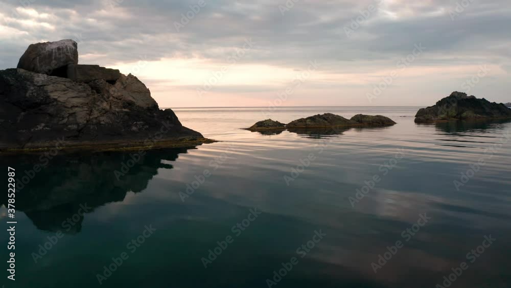 Drone flight at sunrise around a picturesque rocky coastline on the southern coast of the Black Sea, Bulgaria Drone flight at sunrise around a picturesque rocky coastline on the southern coast of the Black Sea, Bulgaria