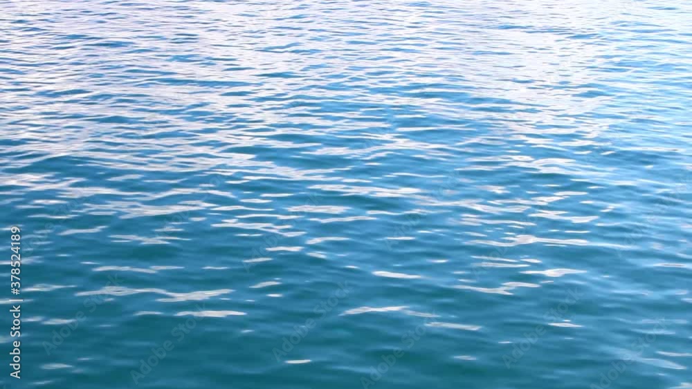 Beautiful blue sea while sailing, smooth wavy surface view from the boat, seascape Beautiful blue sea while sailing, smooth wavy surface view from the boat, seascape
