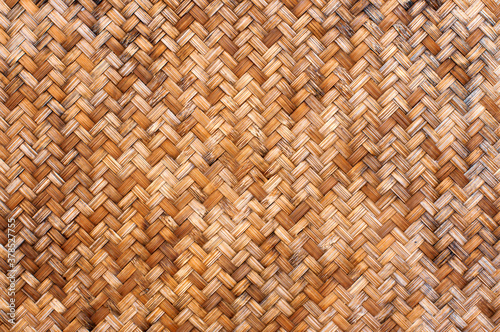 Traditional handcraft woven bamboo texture for background. photo