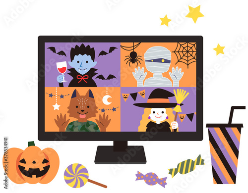 お菓子と一緒にインターネットでリモートパーティー　ハロウィン　黒いデスクトップパソコン