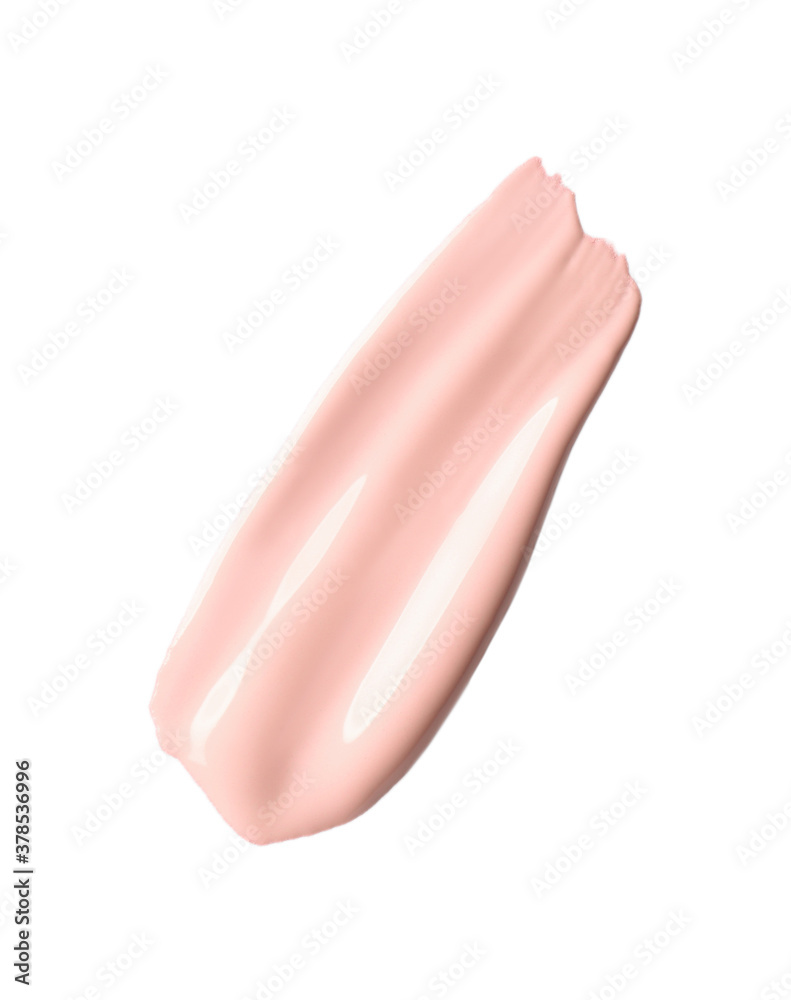 Fototapeta premium Stroke of pink color correcting concealer isolated on white