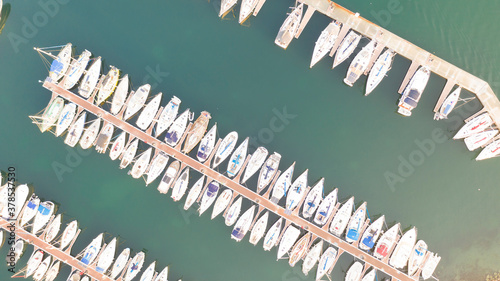 Aerial and vertical view of the Sète marina and its sailboats, on a summer morning, in Herault in Occitanie, France