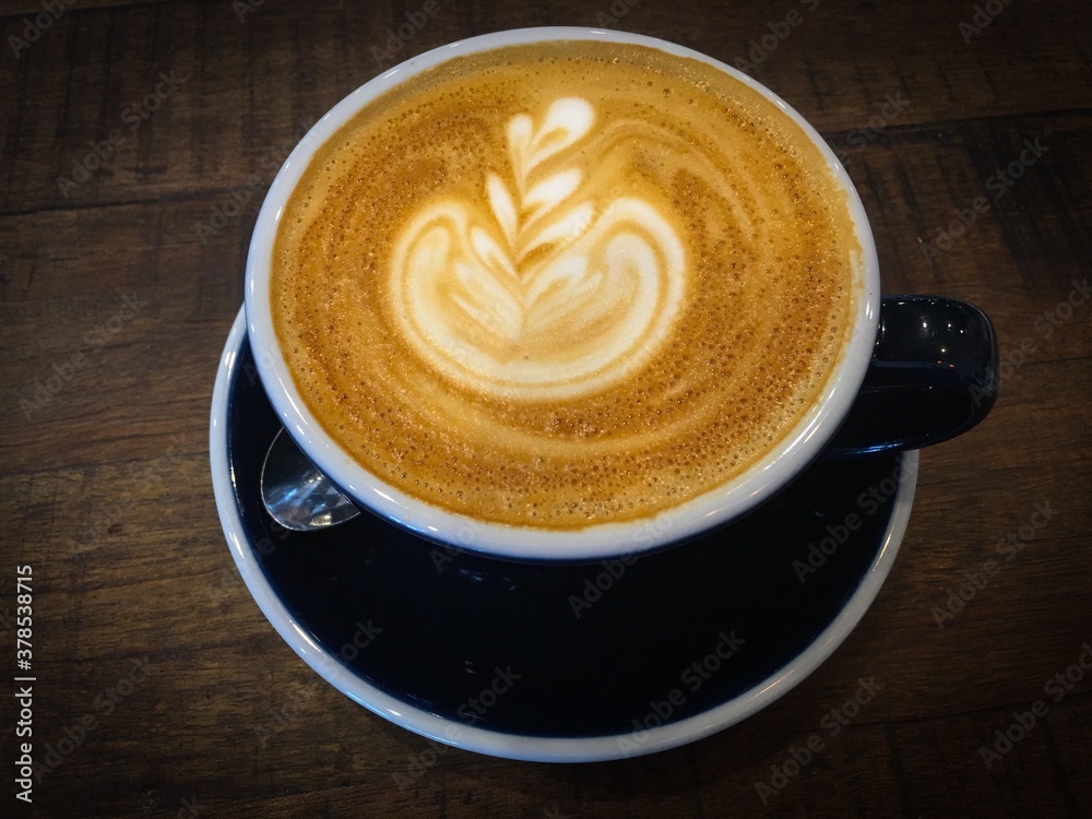 cup of coffee with latte art cup of coffee with latte art