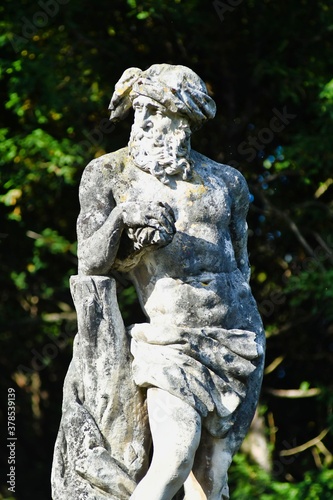 statue of an angel in cemetery, photo as a background photo