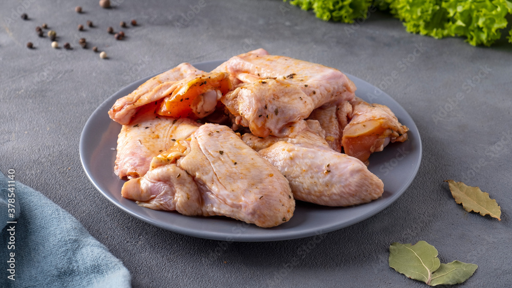 Marinated chicken wings on a plate Marinated chicken wings on a plate