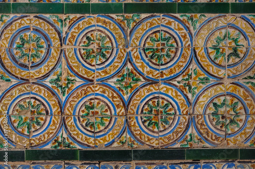 Beautiful ceramic tiles (azulejos) in the Alcazar of Seville, Spain