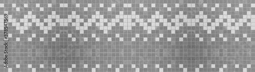 Seamless grunge grey gray white square mosaic concrete cement stone wall tiles pattern texture wide background banner panoramic panorama 