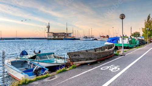 Fishing boats, sport yachts, sailboats and motorboats docked at marina of Cur...