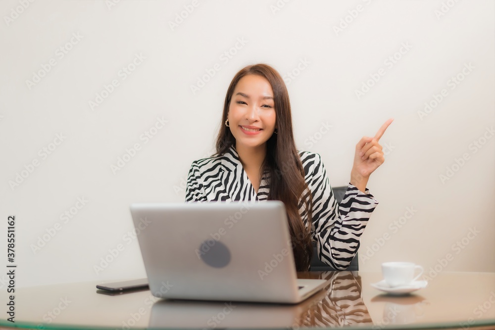 Portrait beautiful young asian woman use computer laptop on working table Portrait beautiful young asian woman use computer laptop on working table