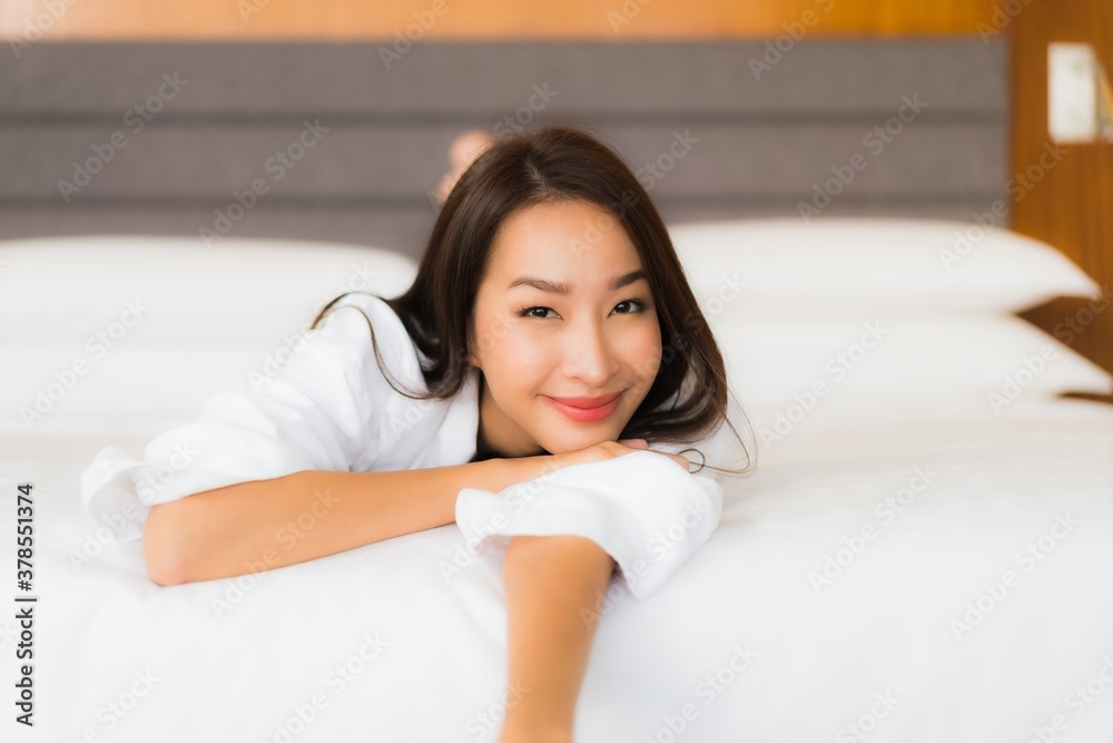 Portrait beautiful young asian woman relax smile on bed Portrait beautiful young asian woman relax smile on bed