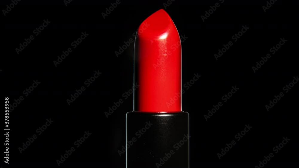 video of a red lipstick rotating in studio video of a red lipstick rotating in studio
