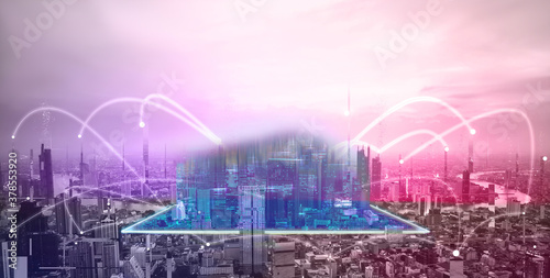 Digital technology modern city network connect in cyber punk theme color concept
