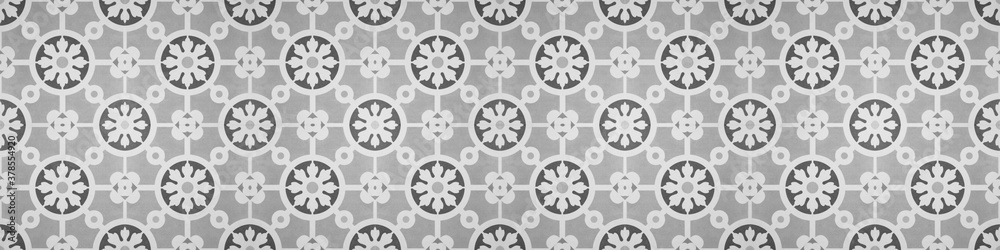 Seamless vintage retro pattern grunge grey gray white concrete cement stone tile wallpaper wall texture, with circle flower leaf square mosaic geometric motif print background banner panorama
