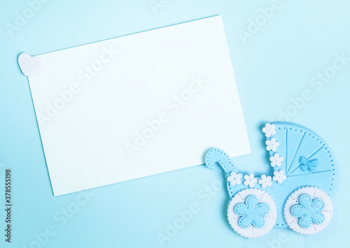 It's a boy blue card. Newborn background. Baby shower invitation. Birth announcement. Flat lay, copy space