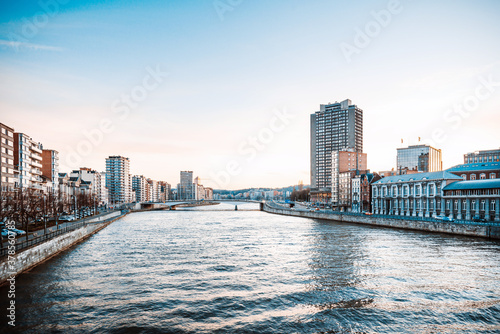LIEGE, BELGIUM - February 24, 2018: Architectural landscape by the river in Liege, Belgium photo