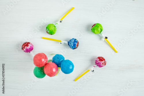 The sweet lollipops of the children on the table