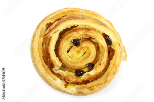 Fresh snail bun with raisins isolated on white