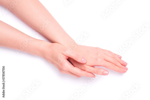 Beautiful female hands showing fresh cute pink manicure  skin and nail care concept  isolated