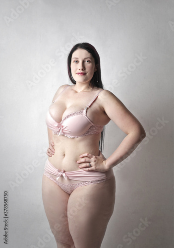 portrait of beautiful curvy girl in lingerie photo
