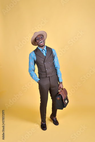 A good-looking man laughing. Hit the jackpot concept.