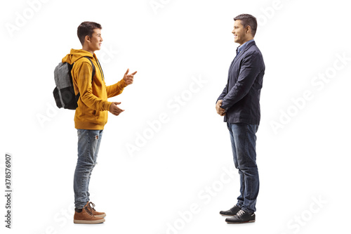 Teenager boy having a conversation with a professional young man
