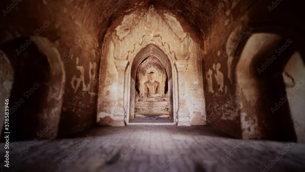 statue of sitting Buddha inside an untitled simple temple in Bagan Myanmar statue of sitting Buddha inside an untitled simple temple in Bagan Myanmar
