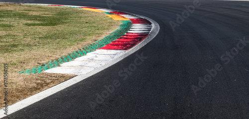 Speed concept, high angle view of asphalt racing circuit track turn © fabioderby