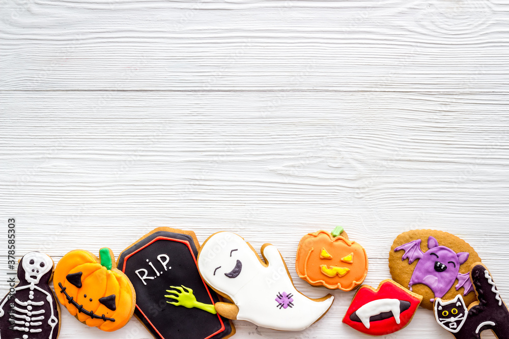 Halloween holiday background with cookies, top view