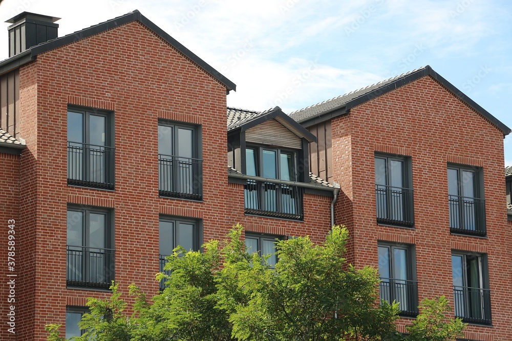 close up of a new beautiful apartment building in the sunshine