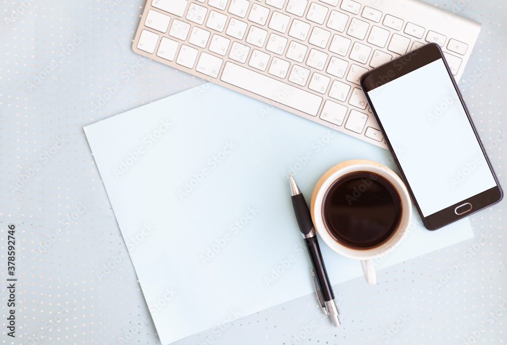 blue office desk background with smartphone with blank screen mockup, laptop computer, cup of coffee and supplies. Top view with copy space, flat lay. blue office desk background with smartphone with blank screen mockup, laptop computer, cup of coffee and supplies. Top view with copy space, flat lay.