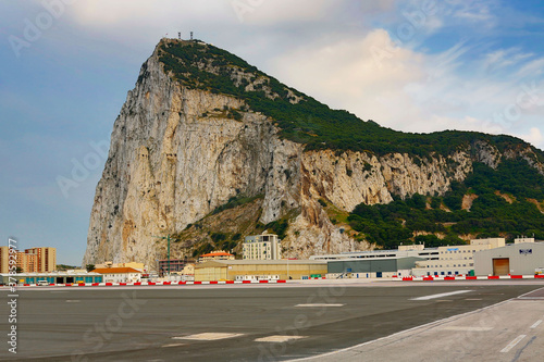 Canvas Print Gibraltar airport runway is in the middle of the city the roar of the Monarch Air fltake offs and landings are deafening