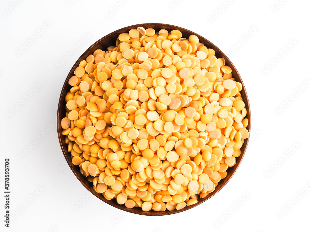 Soybeans seed in a wooden bowl on a white background. Soybeans seed in a wooden bowl on a white background.