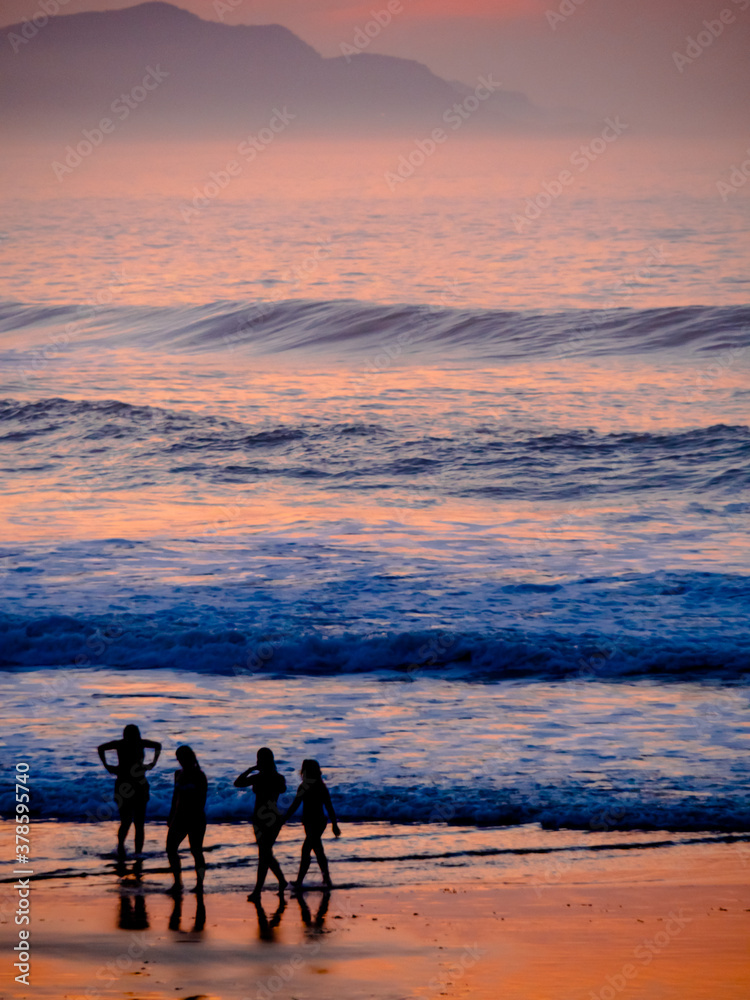 Sunset in zumai with people playing and walking. Sunset in zumai with people playing and walking.