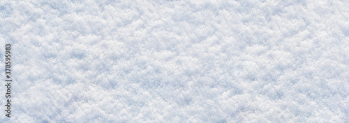 Winter background with white fluffy snow, panorama