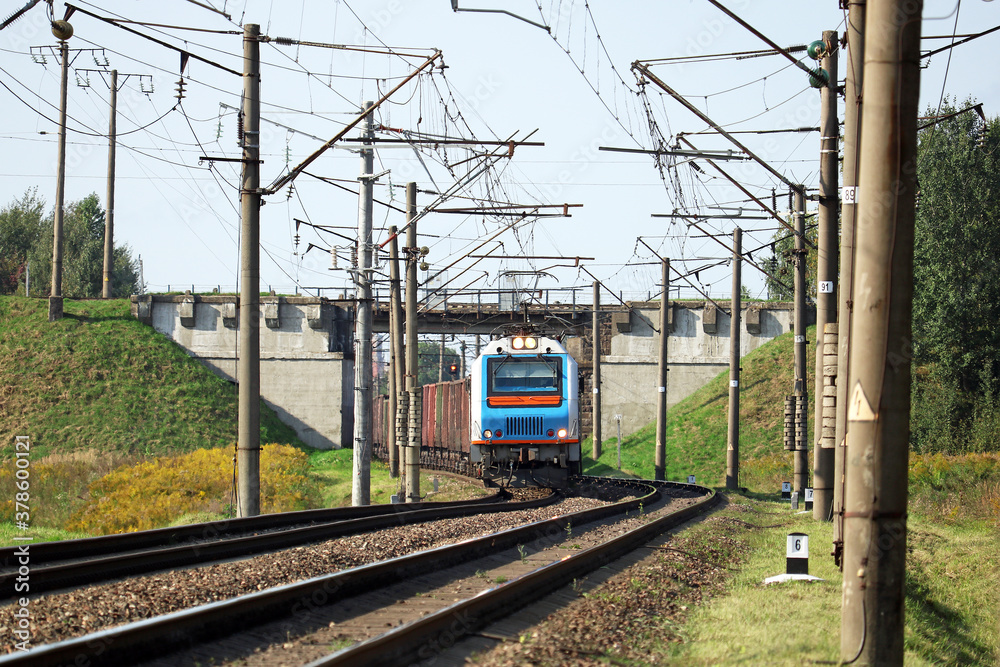 freight electric locomotive departs from the station