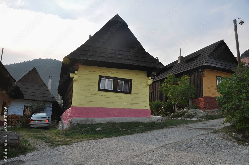 VLKOLINEC, SLOVAKIA, EUROPE, SUMMER 2015. Beautiful street in the center of the Unesco Heritage village of Vlkolinec. The houses are made of wood and painted in neutral colors.