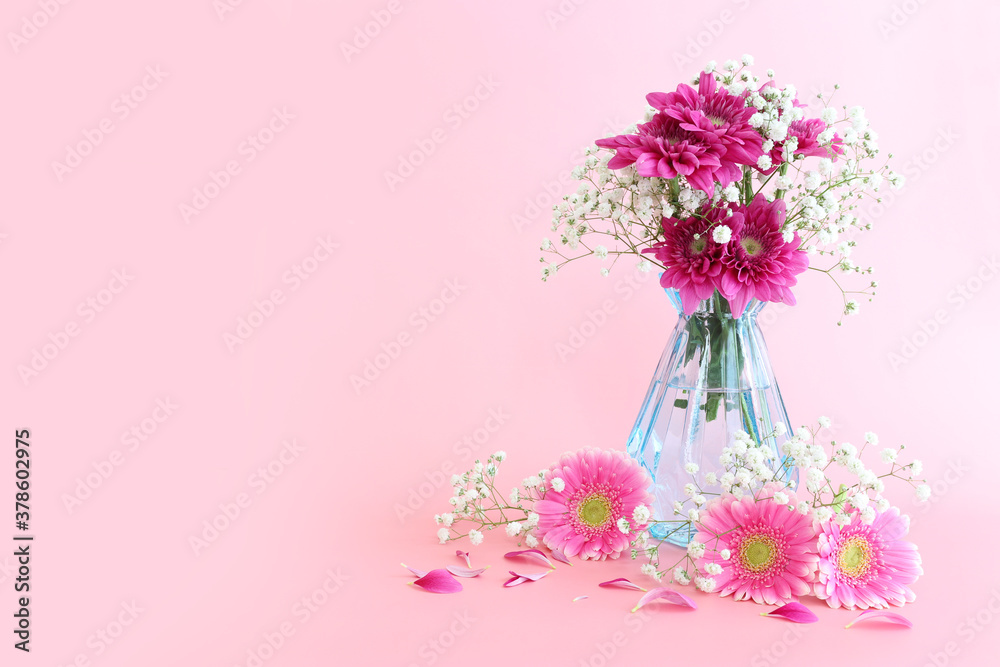 spring bouquet of pink and white flowers over pastel pink background