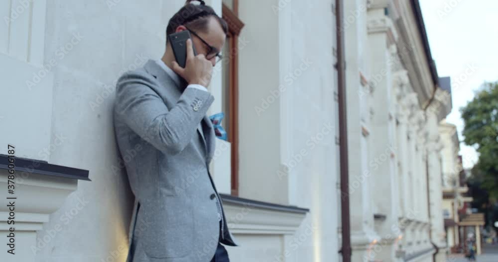 businessman talks on the phone with colleagues and service partners, businessman talks on the phone with colleagues and service partners,