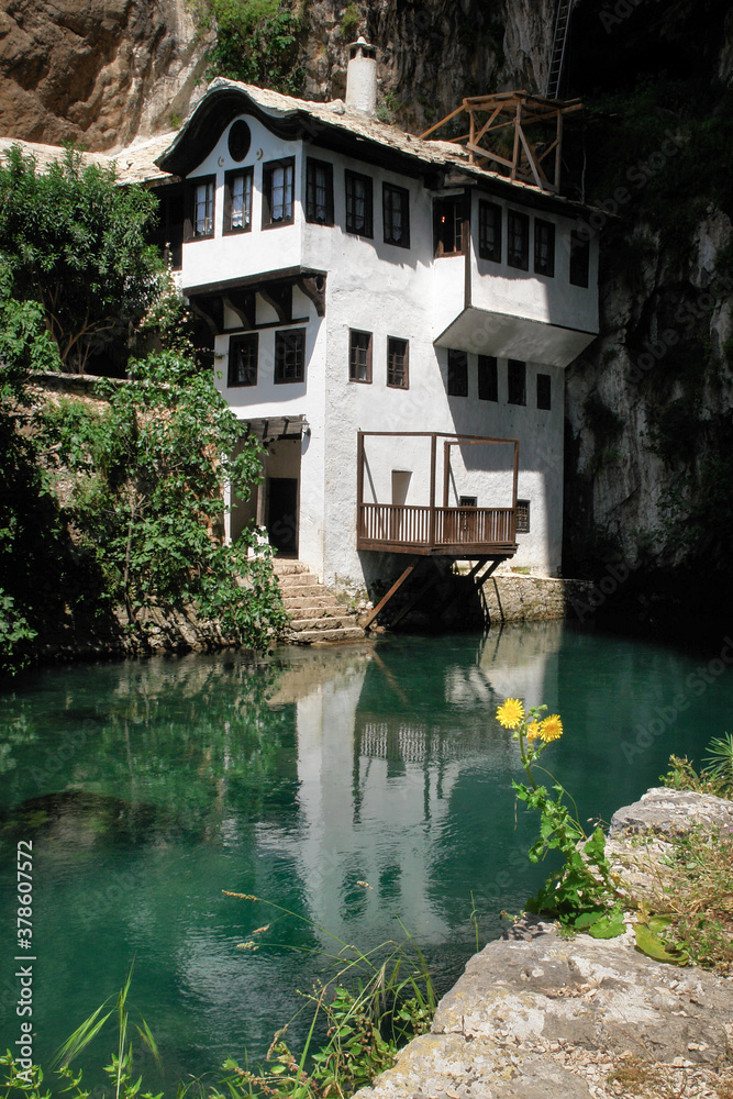 Obraz premium Dervish House or Blagaj Tekija. The building is a Dervish monastery outside Mostar city and nearly 600 years old - Blagaj, Mostar - Bosnia and Herzegovina 