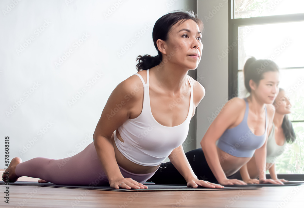 custom made wallpaper toronto digitalGroup of women doing exercise or yoga at home