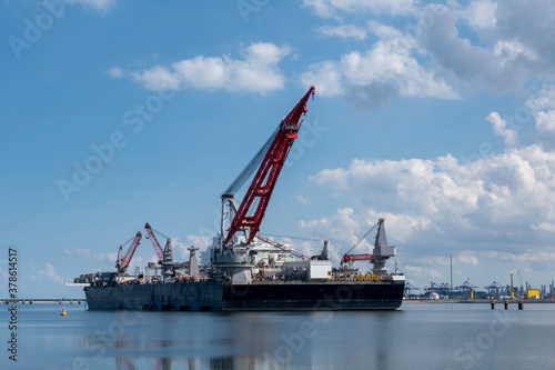 ROTTERDAM, MAASVLAKTE, THE NETHERLANDS Construction vessel moored at the Maasvlakte, Rotterdam in The Netherlands with the new 5000 tonne crane.