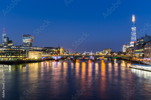 panorama of london over the thames at night