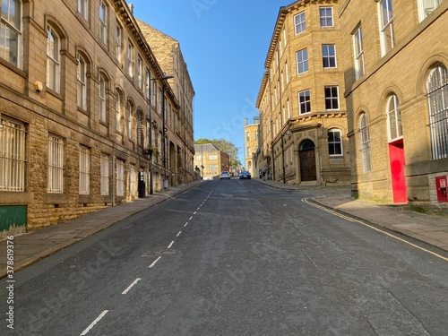 Looking along, Currer Street, at former Victorian textile mills, on a late summers day in, Little Germany, Bradford, Yorkshire, UK