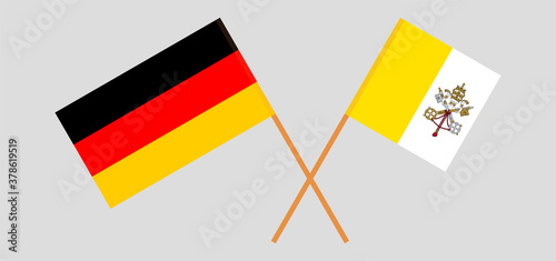 Crossed flags of Vatican and Germany